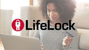 LifeLock. Person making an online transaction.