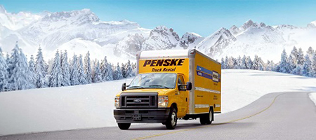 Penske Truck driving on snowy road