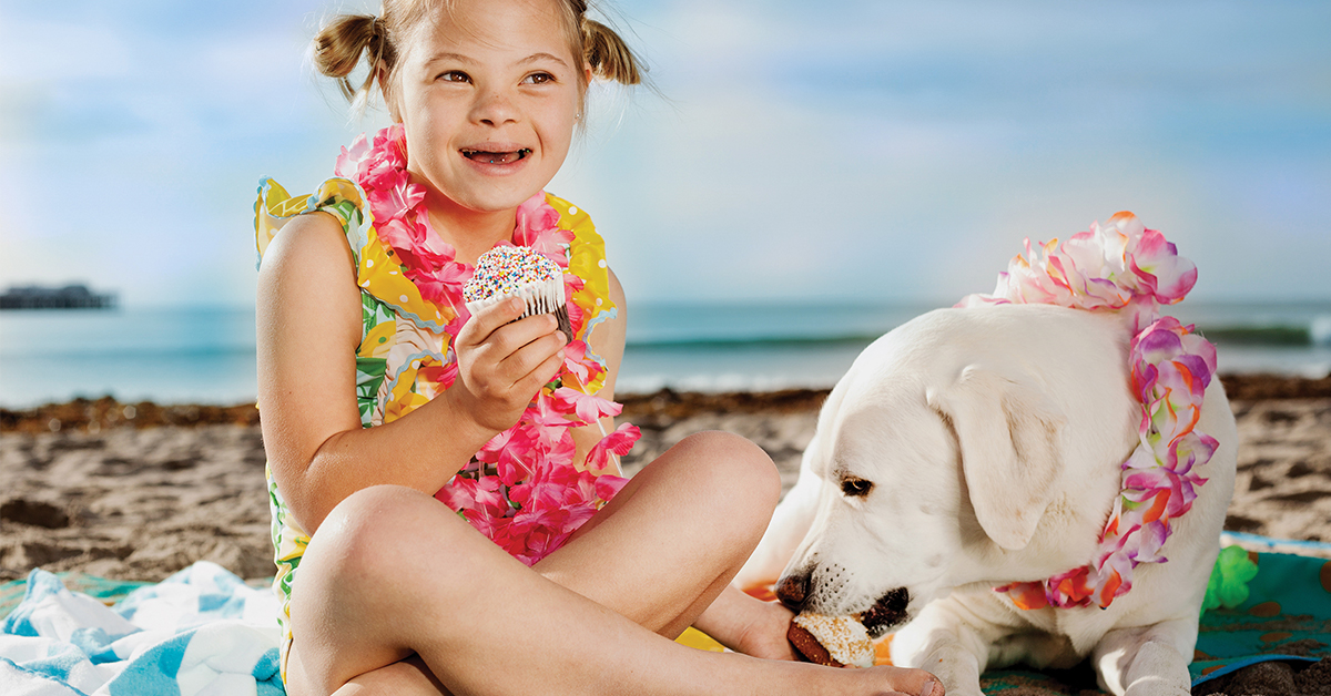 girl and dog on vacation