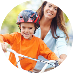 Mom and son riding bicycle